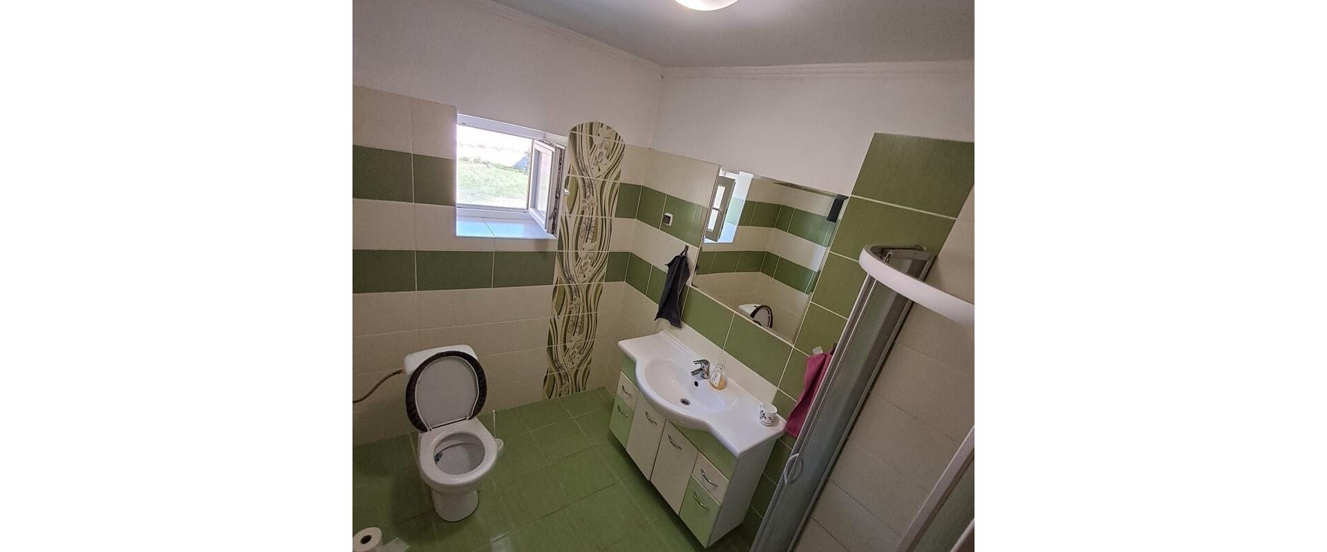 Na predaj stavebný pozemok v Palárikove s malým domčekom