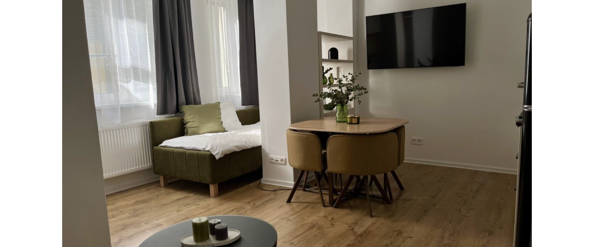 Garsónka v mestskej vile s komunitnou záhradou a s bazénom