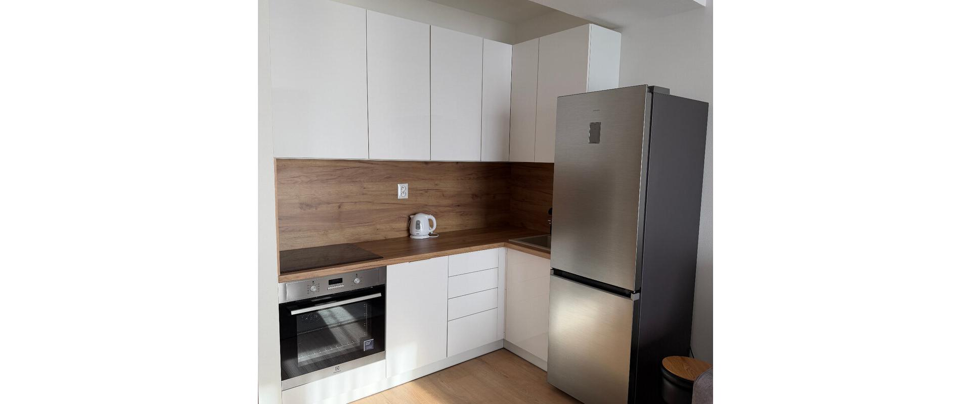 Na  prenájom   1-izbový byt v novostavbe v centre mesta